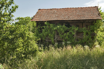 Old rural farm village barn facade with clay wall