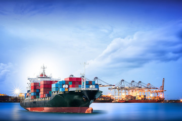 Logistics and transportation of International Container Cargo ship with ports crane bridge in...