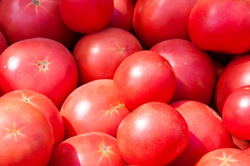 tomatoes on the counter market for sale as a background