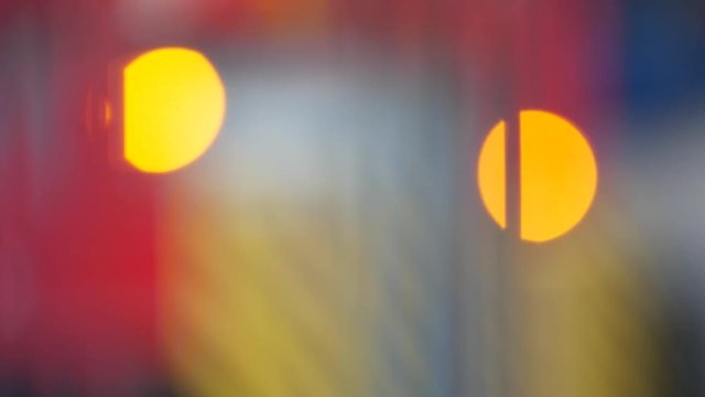 Blurred and unsharp background of construction vehicle Lights flashing