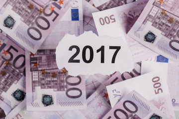Focus on the words 2017  on piece of torn white paper with  EURO