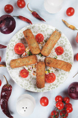 Vegeteable breaded sticks with rice