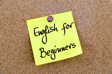 Yellow paper note pinned with Great Britain flag thumbtack and text English For Beginners