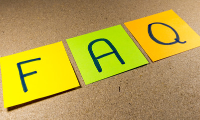 FAQ (Frequently Asked Questions) acronym on colorful sticky note