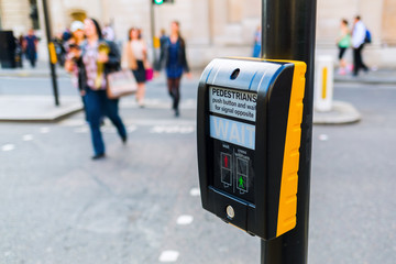 pedestrian button at a pedestrian crossing in London, UK