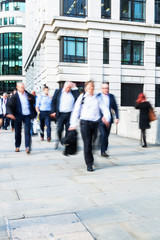 walking commuters at rush hour