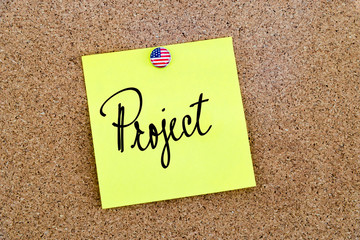 Written text Project over yellow paper note