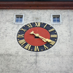 Closeup of an analogue clock on a Biel gate bell tower