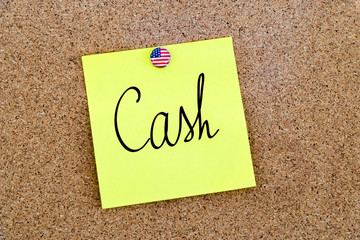 Written text Cash over yellow paper note
