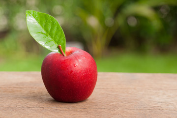 Red appleon wooden, Natural background
