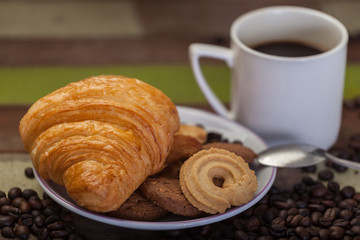 Cookies with cup of coffee