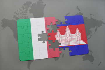 puzzle with the national flag of italy and cambodia on a world map background.