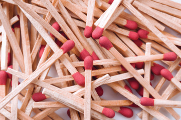 Close-up of red matches on white background