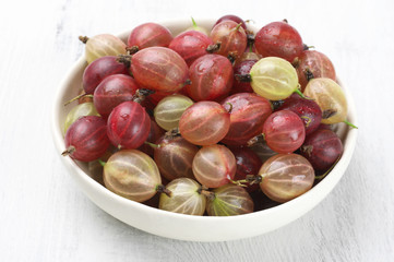 Gooseberries in white bowl