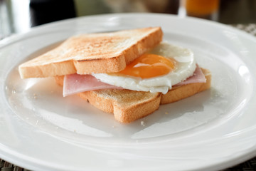 Fresh Grilled Sandwich with ham and egg for breakfast