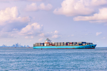 Container ship sailing in the morning.