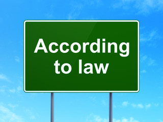 Law concept: According To Law on road sign background