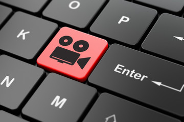 Fototapeta premium Vacation concept: Camera on computer keyboard background