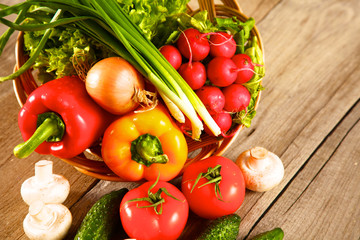 Fresh vegetables on a clean wooden table