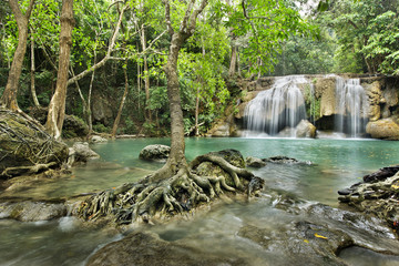waterfall in  deep forest on mountain