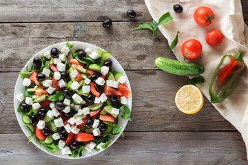 Greek salad and Ingredients, flat lay
