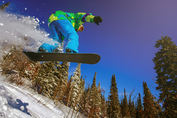 Snowboarder jumping