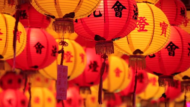 Chinese New Year red and yellow paper lanterns in the temple in Penang, Malaysia