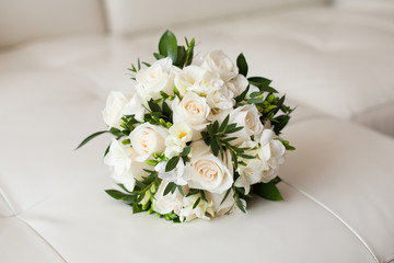Close up of beautiful wedding bouquet on white background