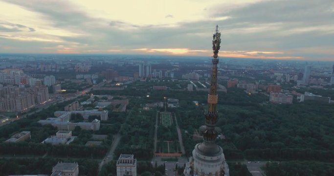 Drone Flying Near the Main Building of of Moscow State University in Moscow in the Dusk on a Summer Day. Epic Aerial view of the City.