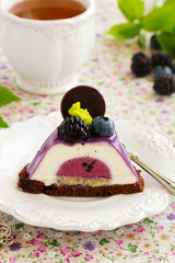 Delicious cake with blackberry-blueberry mousse.