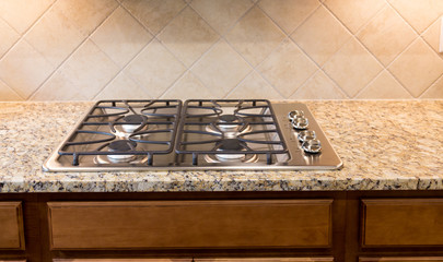 Stainless Gas Cooktop on Granite