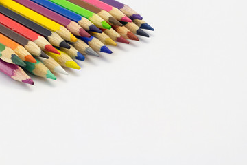 Frame of multicolored pencils isolated on white background