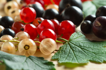 border of fresh berries mix on wooden tabletop