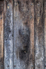 Texture background of old wood with rusty nails