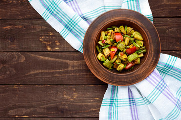Dietary vegetarian salad with grilled zucchini, fresh tomatoes,