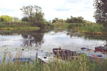Boats on Havel river in summer time (Havelland, Germany)