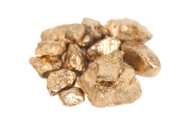 Golden nuggets isolated on white background
