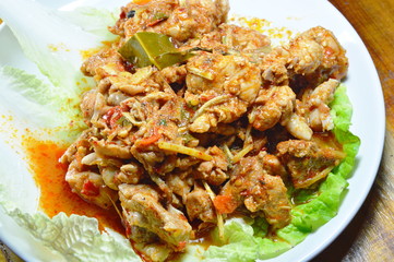 spicy stir fried chicken with herb on Chinese cabbage