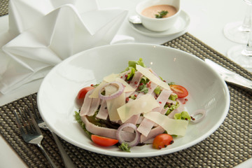  salad with lettuce,cheese, tomato, and ham