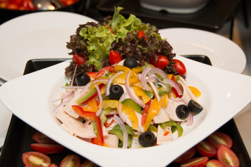  fresh salad with pepper, ham and  lettuce,