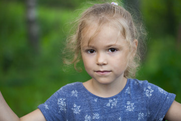Portrait of the beautiful blonde little girl