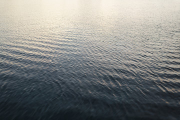 deep blue water surface of the bay
