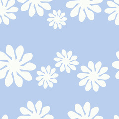 Cute seamless pattern with white chamomiles on a pastel blue background