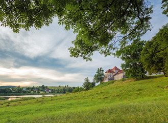 Evening landscape with a castle in Svirzh, Ukraine