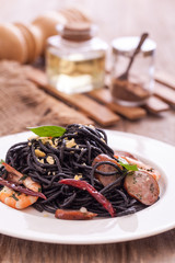 Black spaghetti with shrimps and sausage