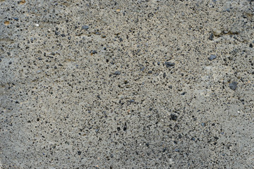 Wall fragment with scratches and cracks