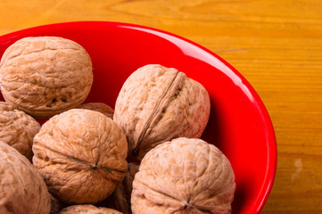 walnuts in red plate