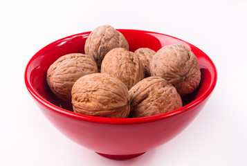 walnuts in red plate