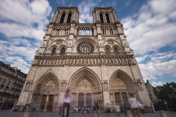 Fototapeta na wymiar Notre Dame de Paris. France. Ancient catholic cathedral on the quay of a river Seine. Famous touristic architecture landmark in summer