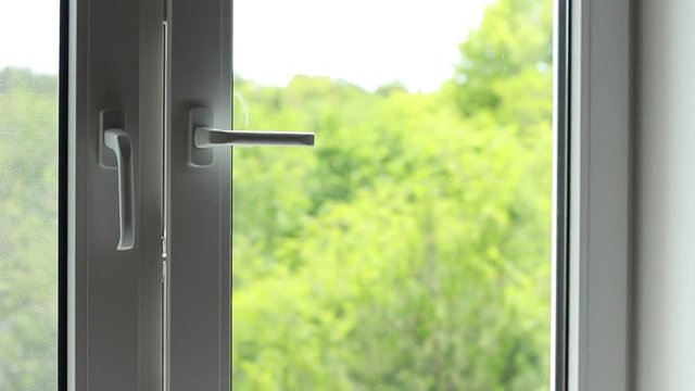 Closing window into a garden